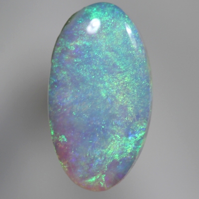 SOLID CRYSTAL OPAL Bright green fire plays in a 3D pattern throughout the opal